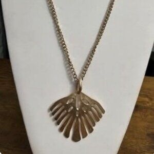 Gold necklace (can't decide if it's a feather or a fish tale....)